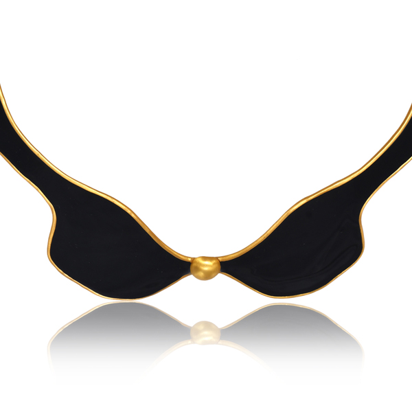 Black enamelled sculptural choker necklace with Gold accents and contemporary artistic design.