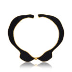 Black enameled sculptural choker necklace with gold asscents and contemporary artistic designs.
