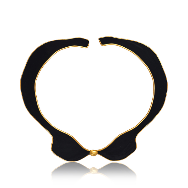 Black enameled sculptural choker necklace with gold asscents and contemporary artistic designs.